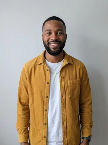 Photo of a man in a mustard overshirt used as the lead singer in an Outstanding Tiny Desk video